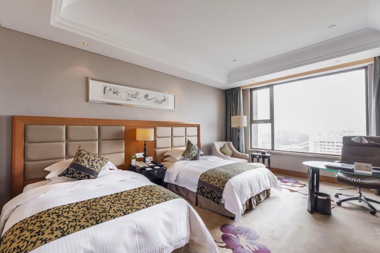 Hotel Wyndham Xinyang Downtown Exterior foto