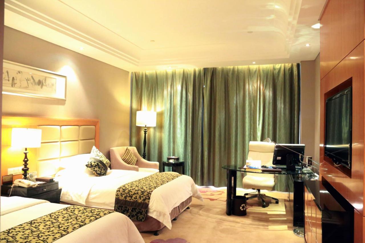 Hotel Wyndham Xinyang Downtown Exterior foto