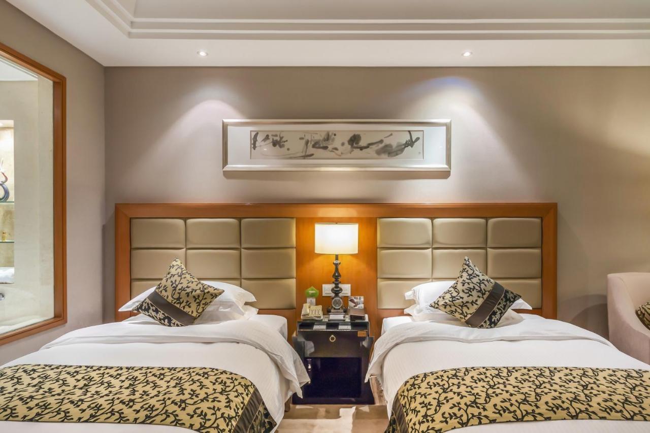 Hotel Wyndham Xinyang Downtown Exterior foto