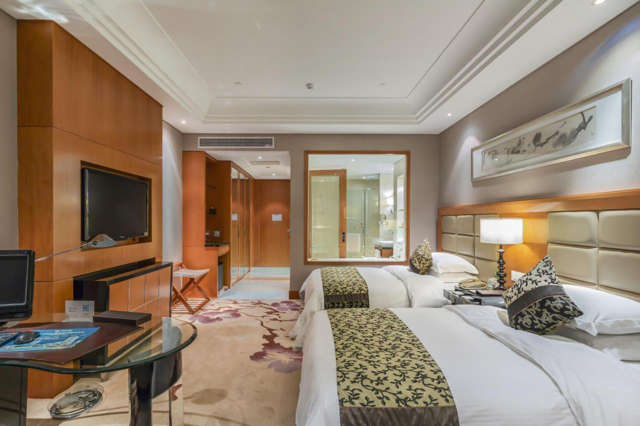 Hotel Wyndham Xinyang Downtown Exterior foto